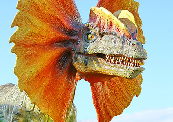 Image showing Dilophosaurus dinosaur with orange collar