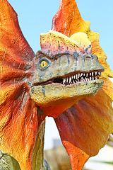 Image showing Dilophosaurus dinosaur with orange collar