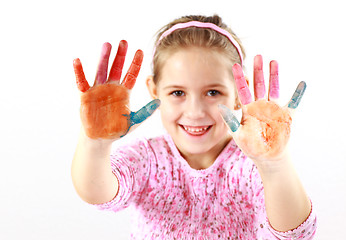 Image showing Little girl with painted hands