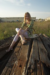 Image showing Woman on industrial background