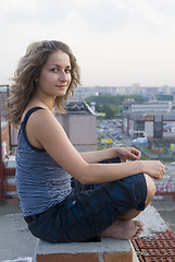 Image showing Girl on roof