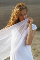 Image showing Young woman with white scarf