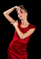 Image showing Sexy slim woman in red dress