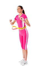 Image showing Young attractive woman holding hula hoop