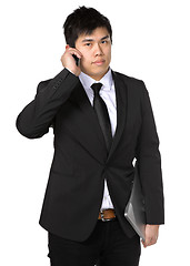 Image showing young business man with mobile phone
