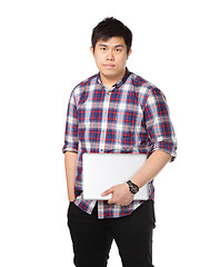 Image showing asian man holding laptop computer