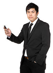 Image showing young business man with mobile phone