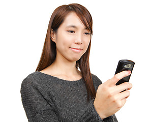 Image showing girl text on mobile phone