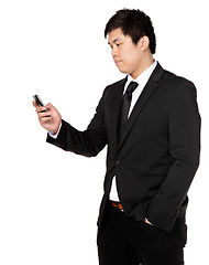 Image showing young business man with mobile phone