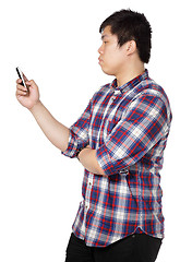 Image showing man writing message on mobile phone