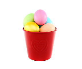 Image showing Colorful Easter eggs in a red bucket.