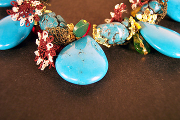 Image showing blue necklace