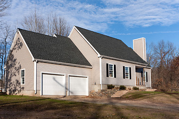 Image showing Vinyl Sided House with 2 Car Garage