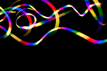 Image showing Rainbow Light Trails on Black