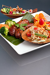 Image showing Thai Sausage with Som Tum Salad