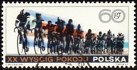 Image showing Post stamp shows group of cyclists