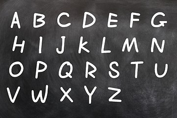 Image showing English alphabet handwritten with white chalk on a blackboard