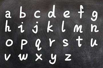 Image showing English alphabet handwritten with white chalk on a blackboard