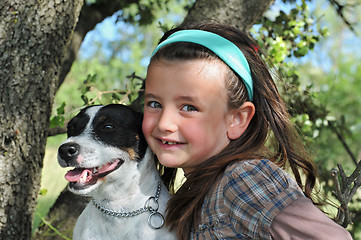 Image showing little girl and dog