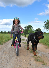 Image showing little girl and her dog