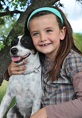 Image showing little girl and dog