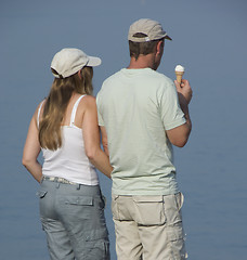 Image showing Couple relaxing by sea