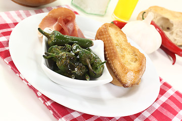 Image showing Pimientos de padron and nut ham