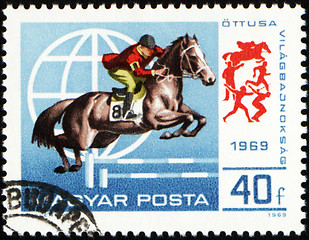 Image showing Jumping show on post stamp