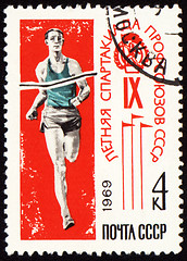 Image showing Post stamp shows running sportsman