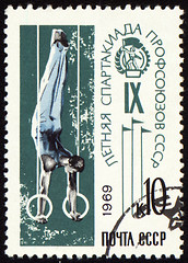 Image showing Post stamp shows gymnast on rings