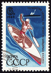 Image showing Canoe oarsman on post stamp