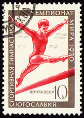 Image showing Post stamp shows female gymnast on balance beam