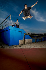 Image showing Skateboarder flying