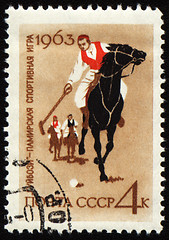 Image showing Guybozi - horse folk game in Pamir on post stamp