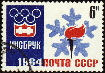 Image showing Olympic torch and emblem on post stamp