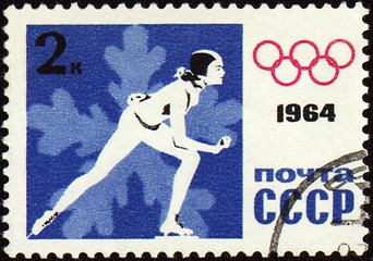 Image showing Running skater on post stamp