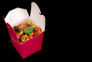 Image showing Halloween candy in a red chinese food container