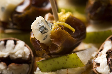 Image showing Appetizer Plate with Dactyl, Pecan nuts and Cheese