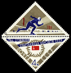 Image showing Running skater on post stamp