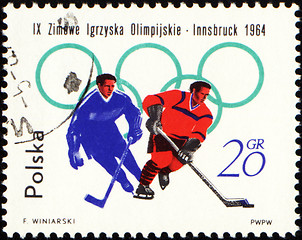 Image showing Two hockey players on post stamp