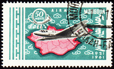 Image showing Flying air liner and map of Mongolia on post stamp