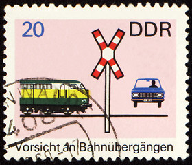 Image showing Post stamp with car on a railway crossing