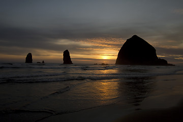 Image showing Sunset over Haystack Rock in Cannon Beach