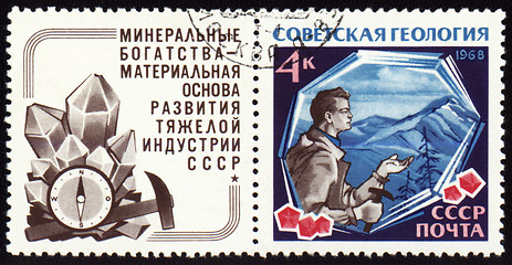 Image showing Geologist with hammer on post stamp