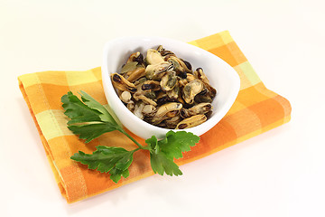 Image showing Mussels with flat leaf parsley