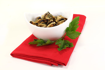 Image showing marinated Mussels with flat leaf parsley