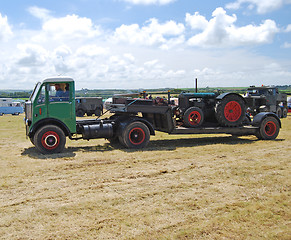 Image showing Old Articulated Lorry and Farm Tractor