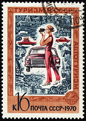 Image showing Woman with the camera on post stamp