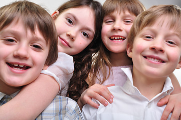 Image showing happy group of children hugging together