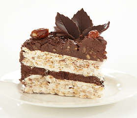 Image showing chocolate and hazelnuts cake, selective focus